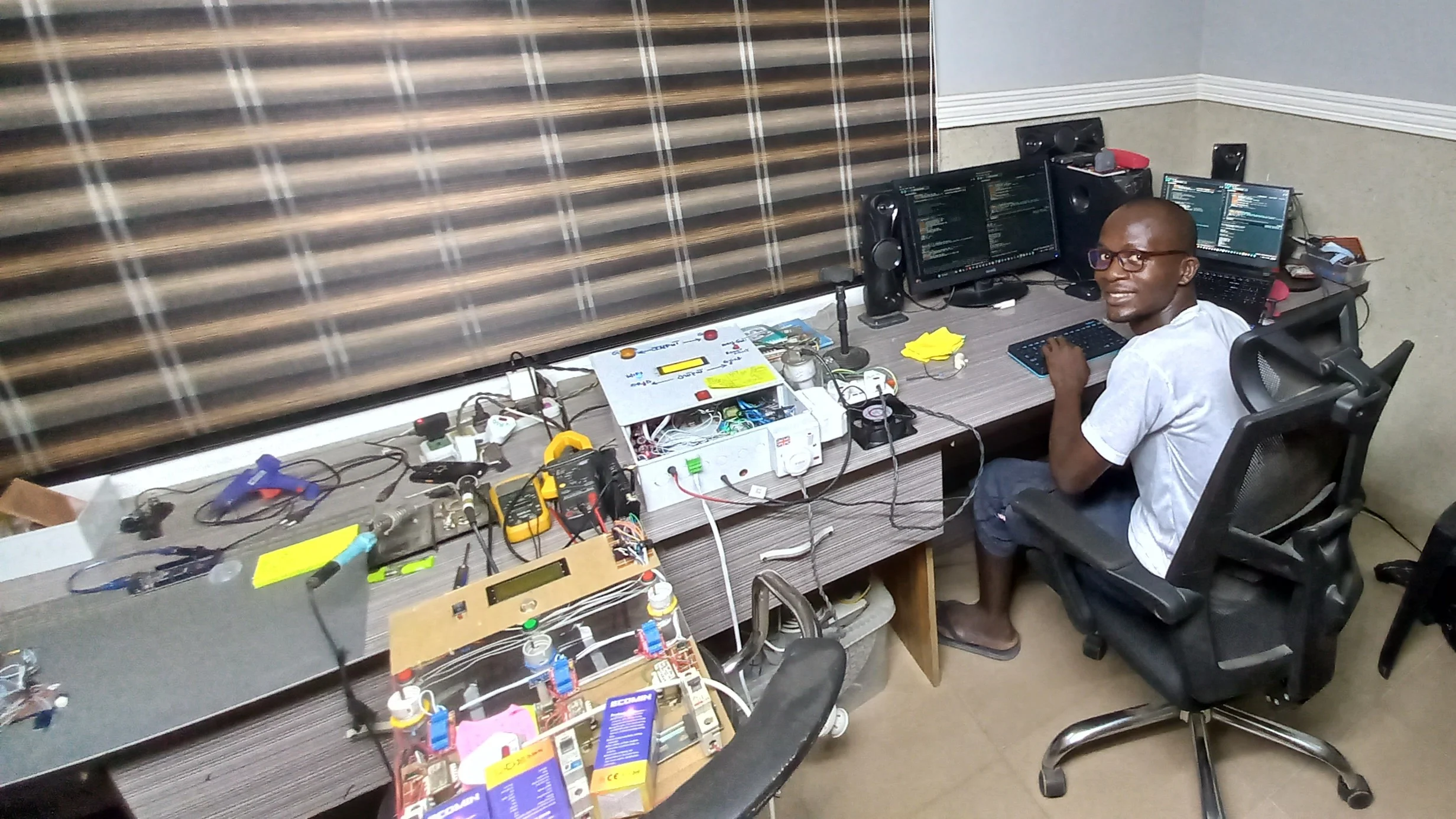 Damilare Adekeye working on a project