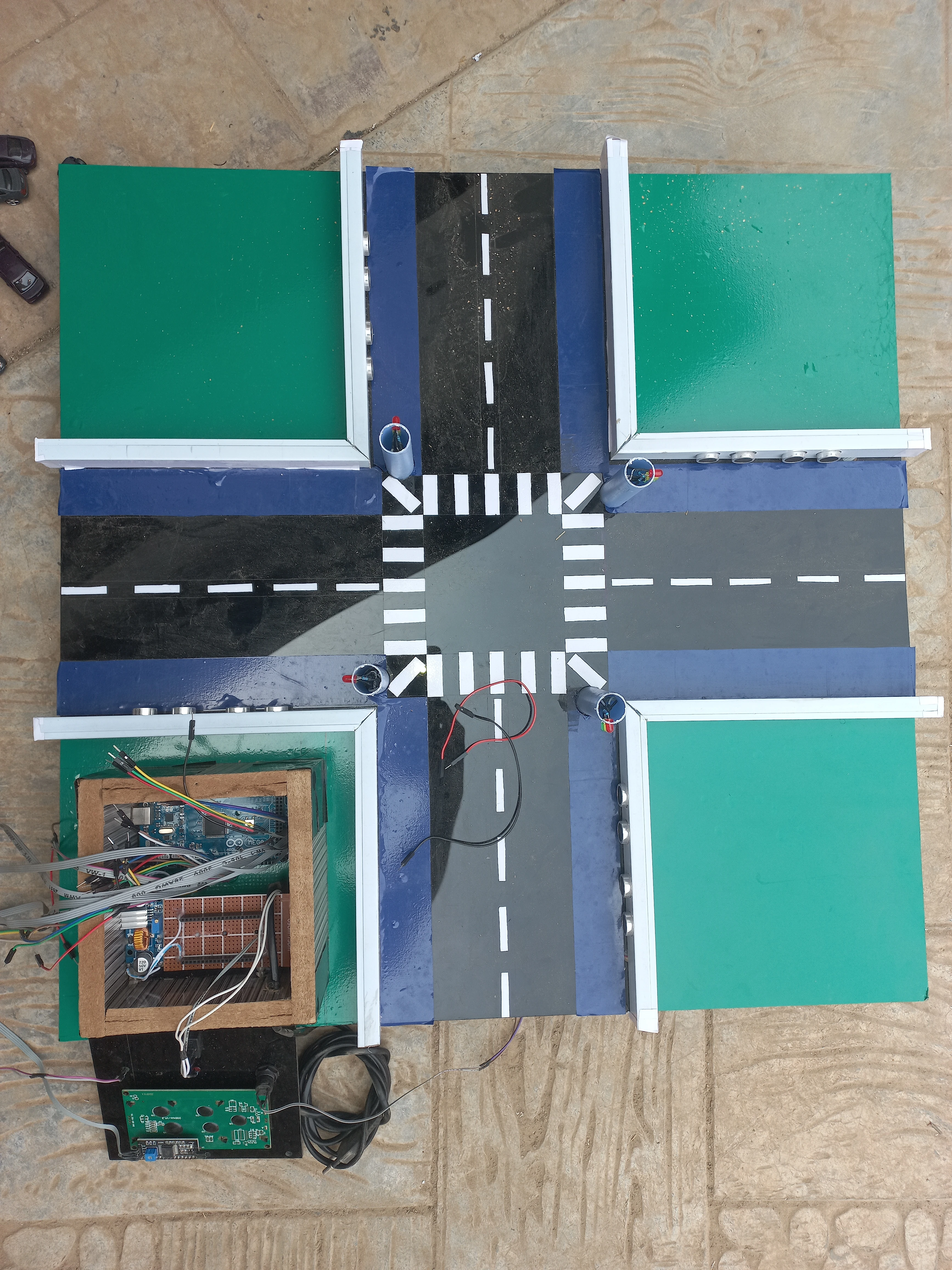 Final road model — top view showing intersection, LEDs, and sensor bars