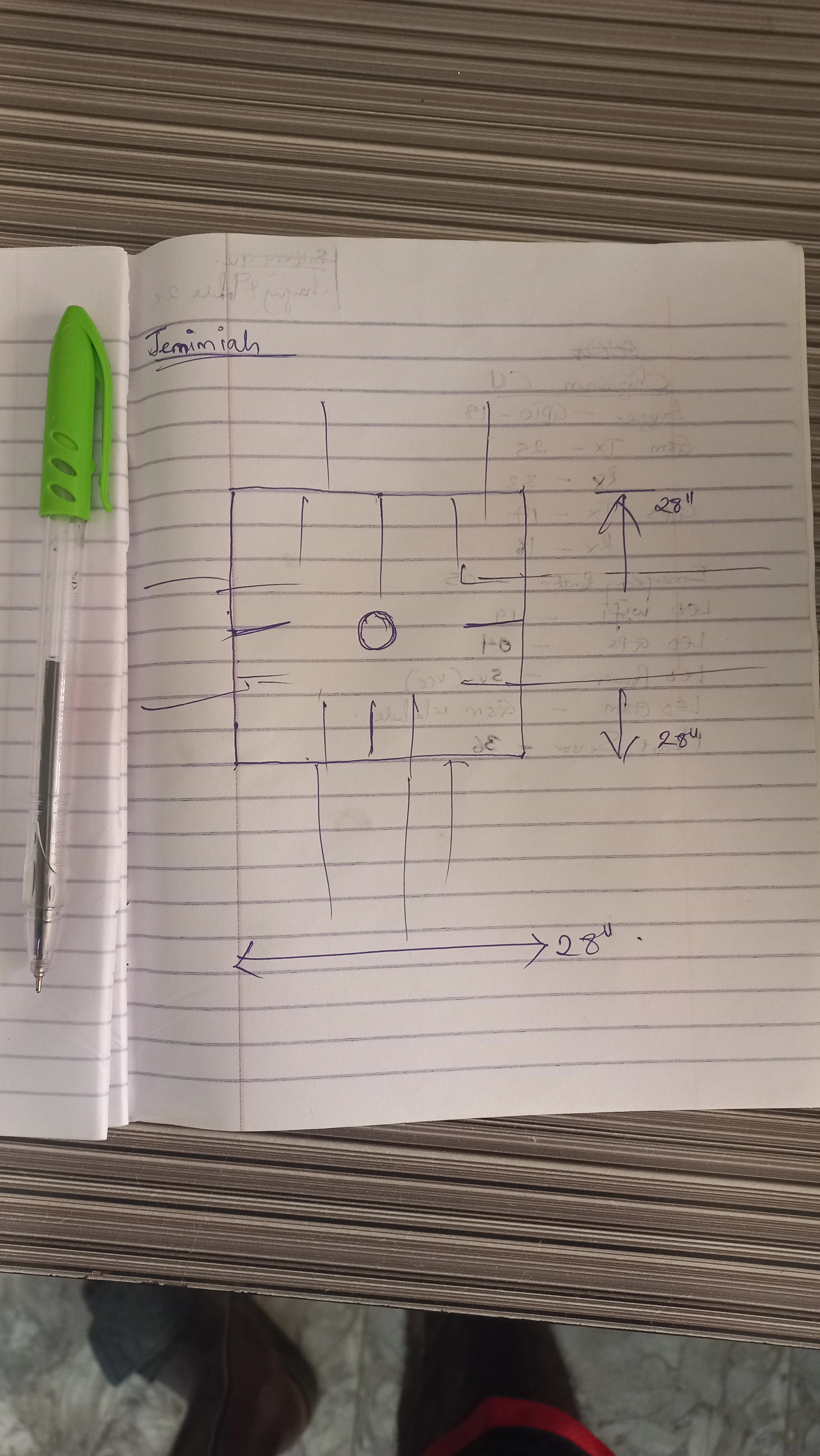 Hand-drawn circuit schematic sketch in notebook