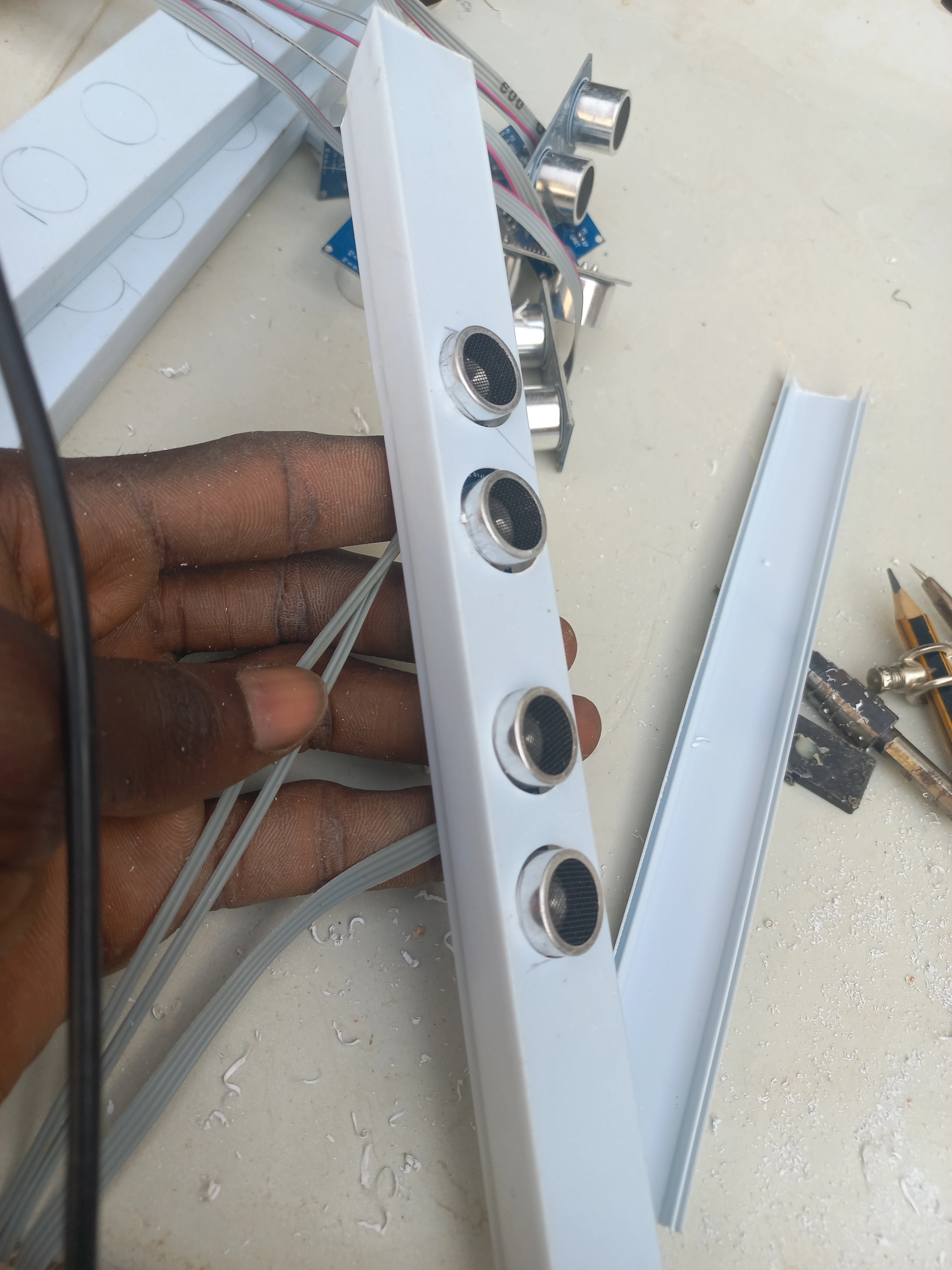 Sensor bar with four HC-SR04 sensors mounted — angle 1