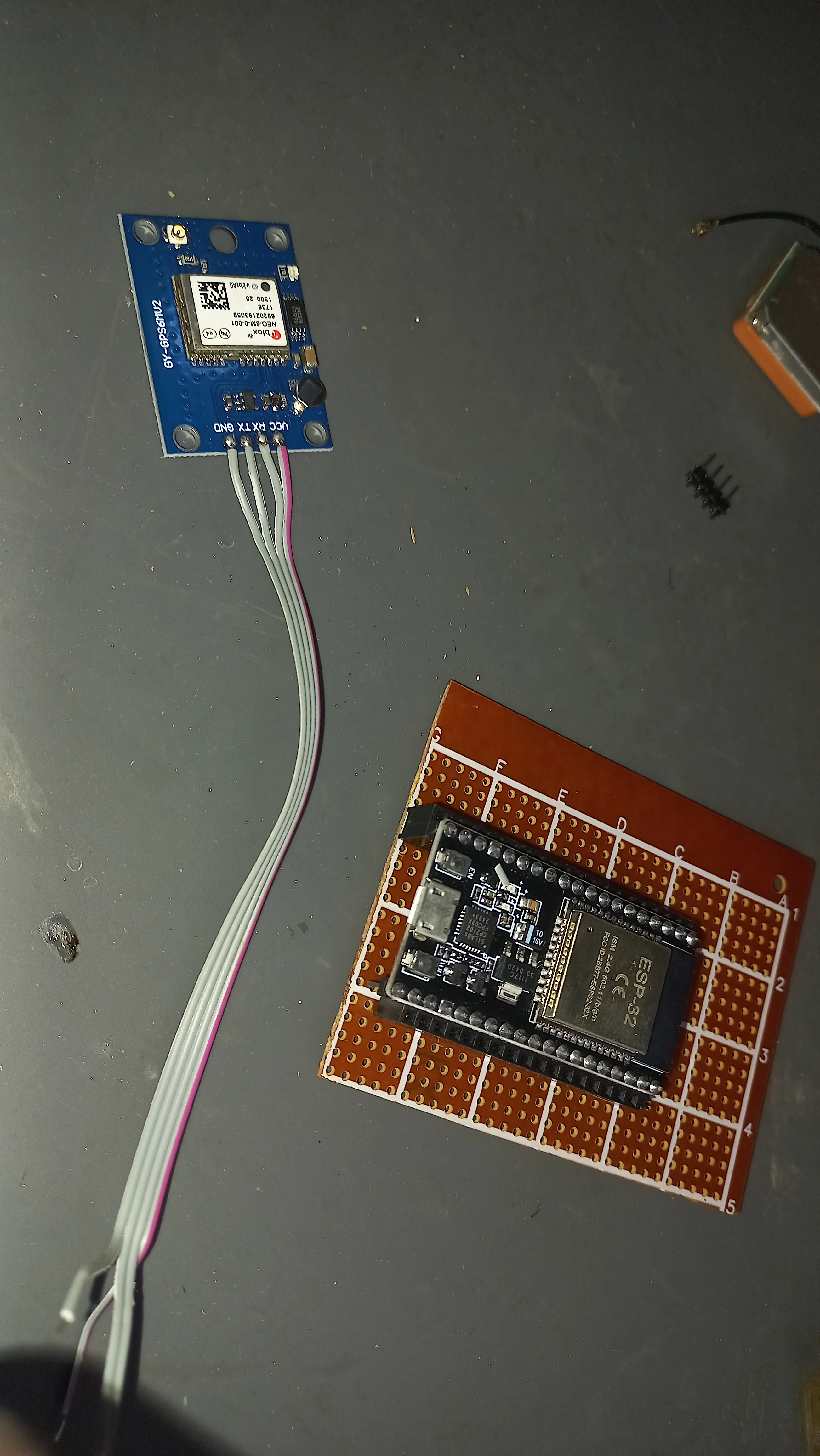 ESP32 positioned on perfboard with GPS